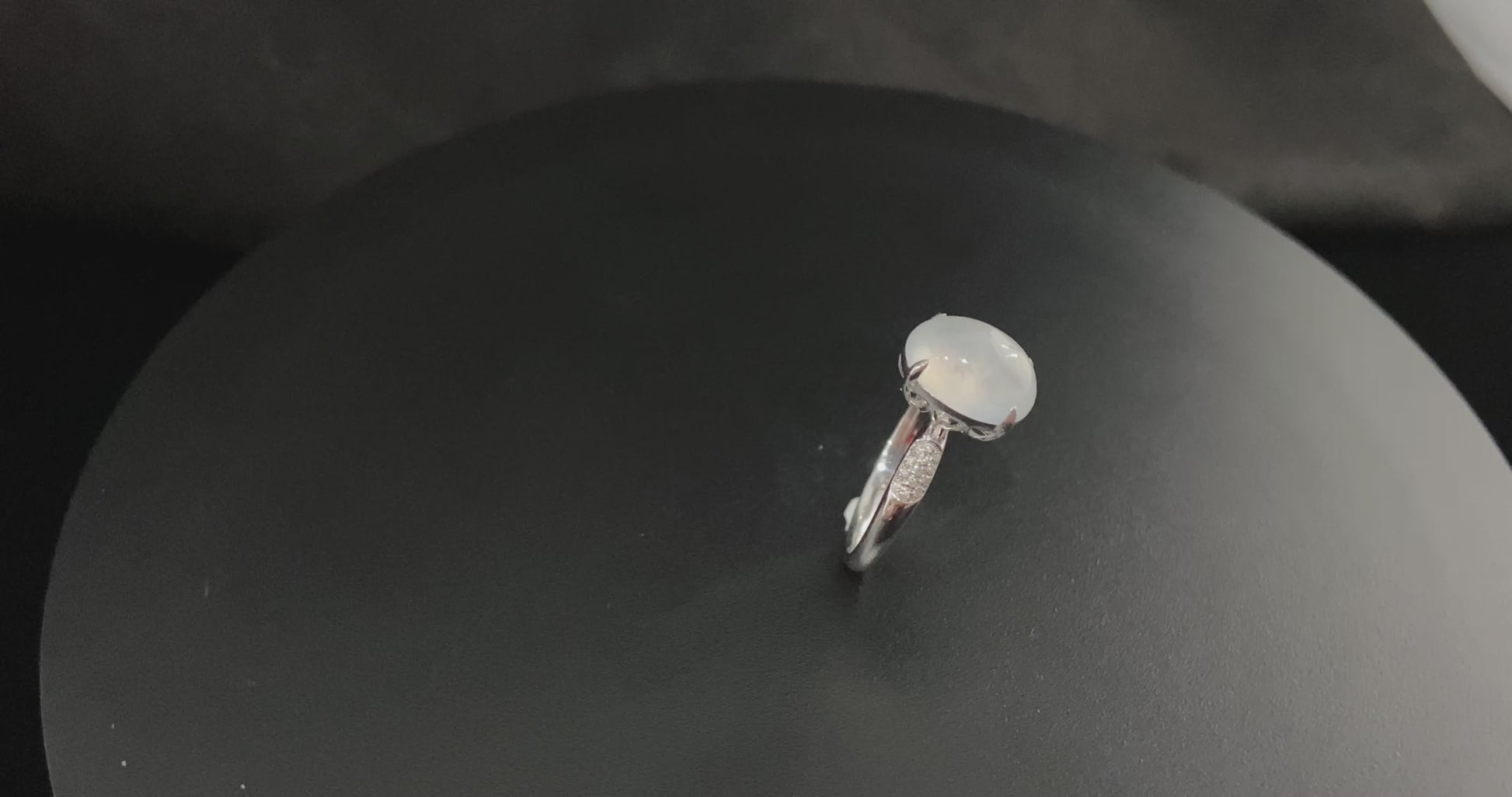 A moonlit ice cabochon jadeite ring.