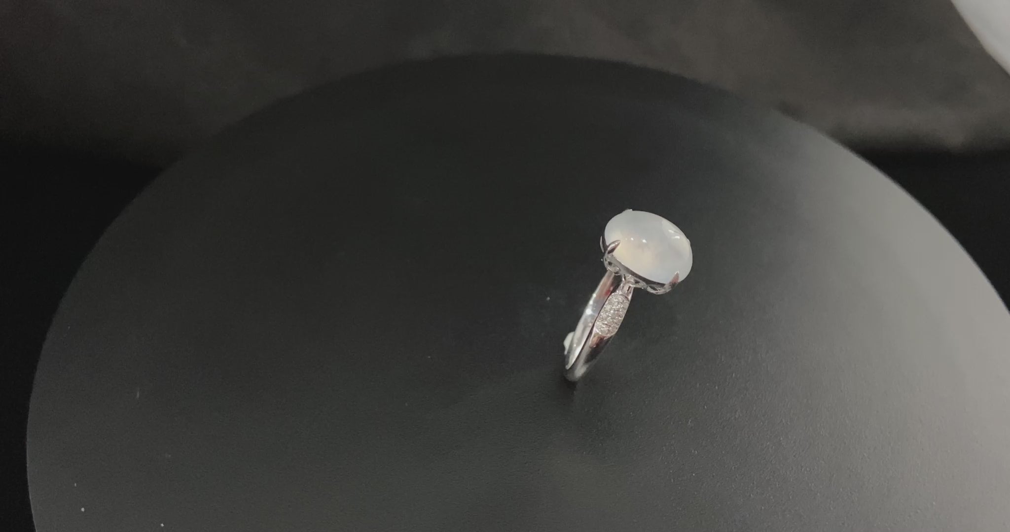 A moonlit ice cabochon jadeite ring.