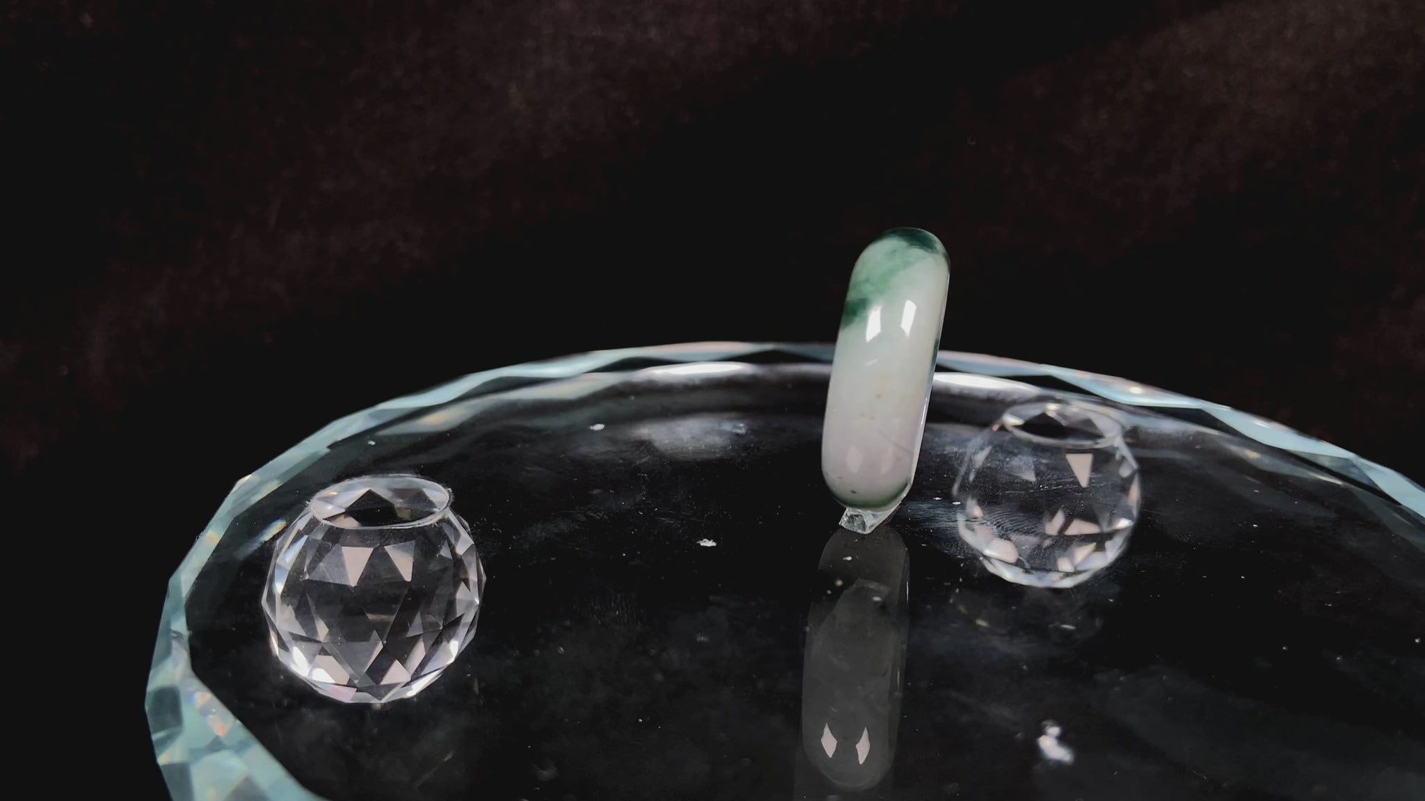 A swirling green ink veil jadeite ring.