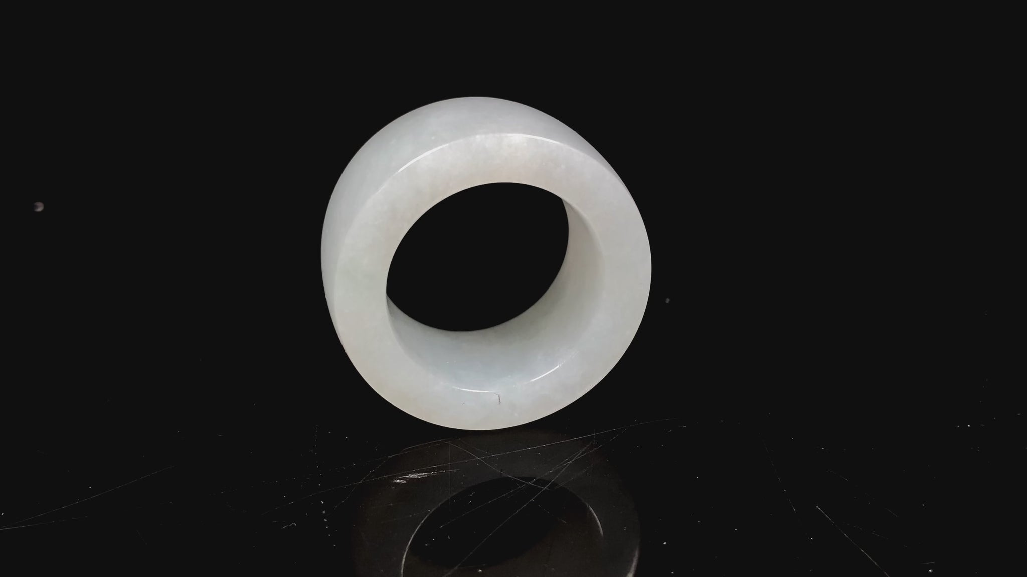 A creamy milky white thumb ring jadeite ring.