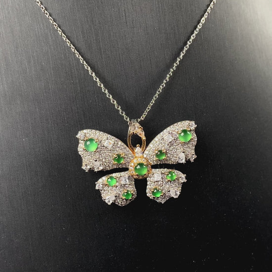 A green butterfly sparkle jadeite pendant.