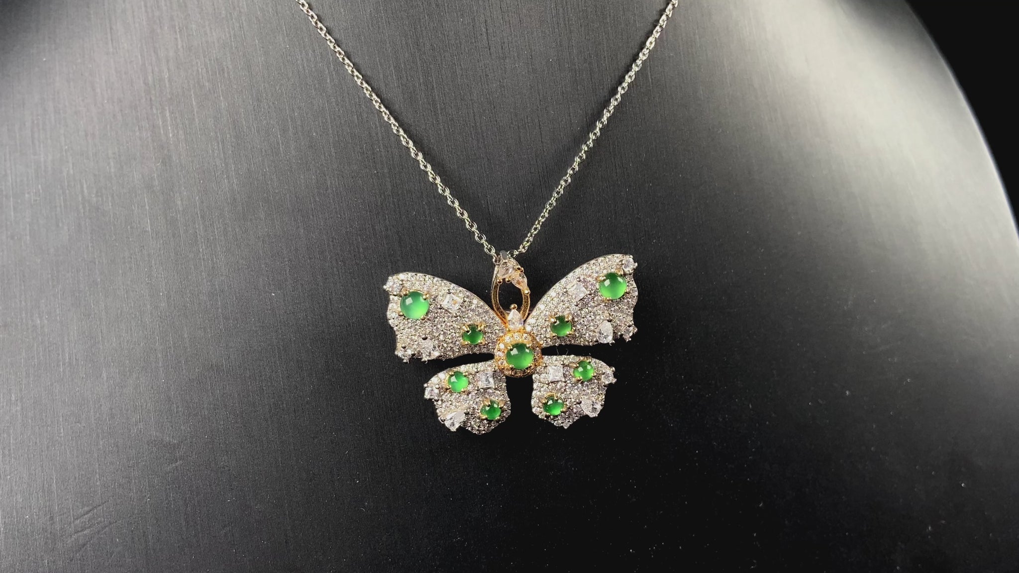 A green butterfly sparkle jadeite pendant.