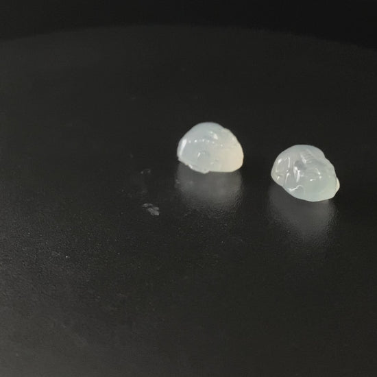 A glacial moonlight Pixiu pair loose jadeite.