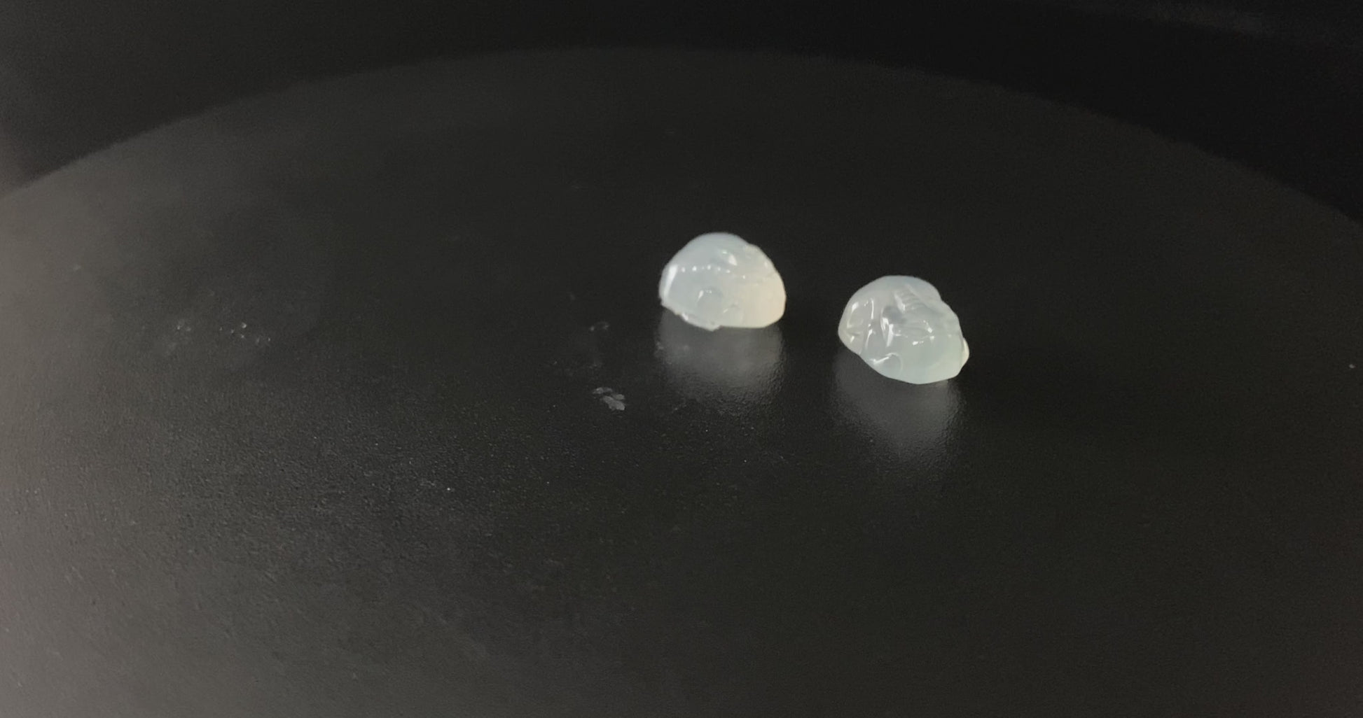 A glacial moonlight Pixiu pair loose jadeite.