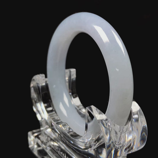 A moonlit white with pale blue jadeite bangle.