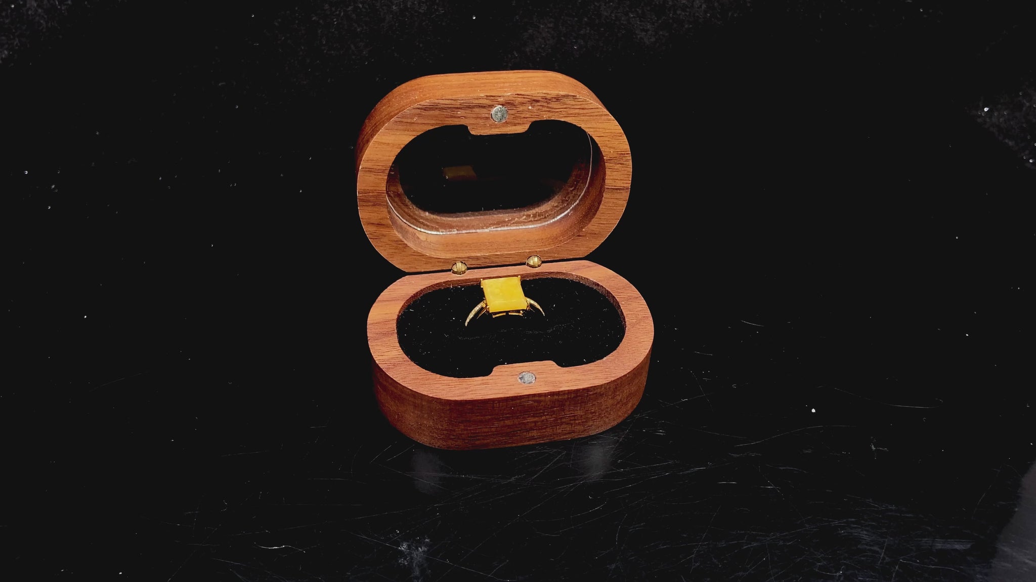A rich yellow square jadeite ring.