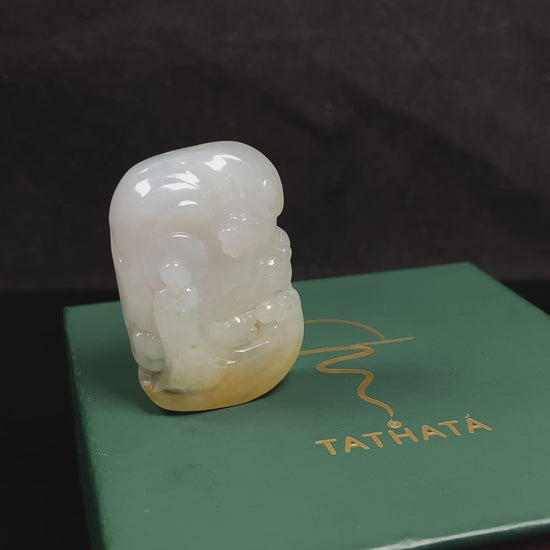 A auspicious yellow white buddha loose jadeite.