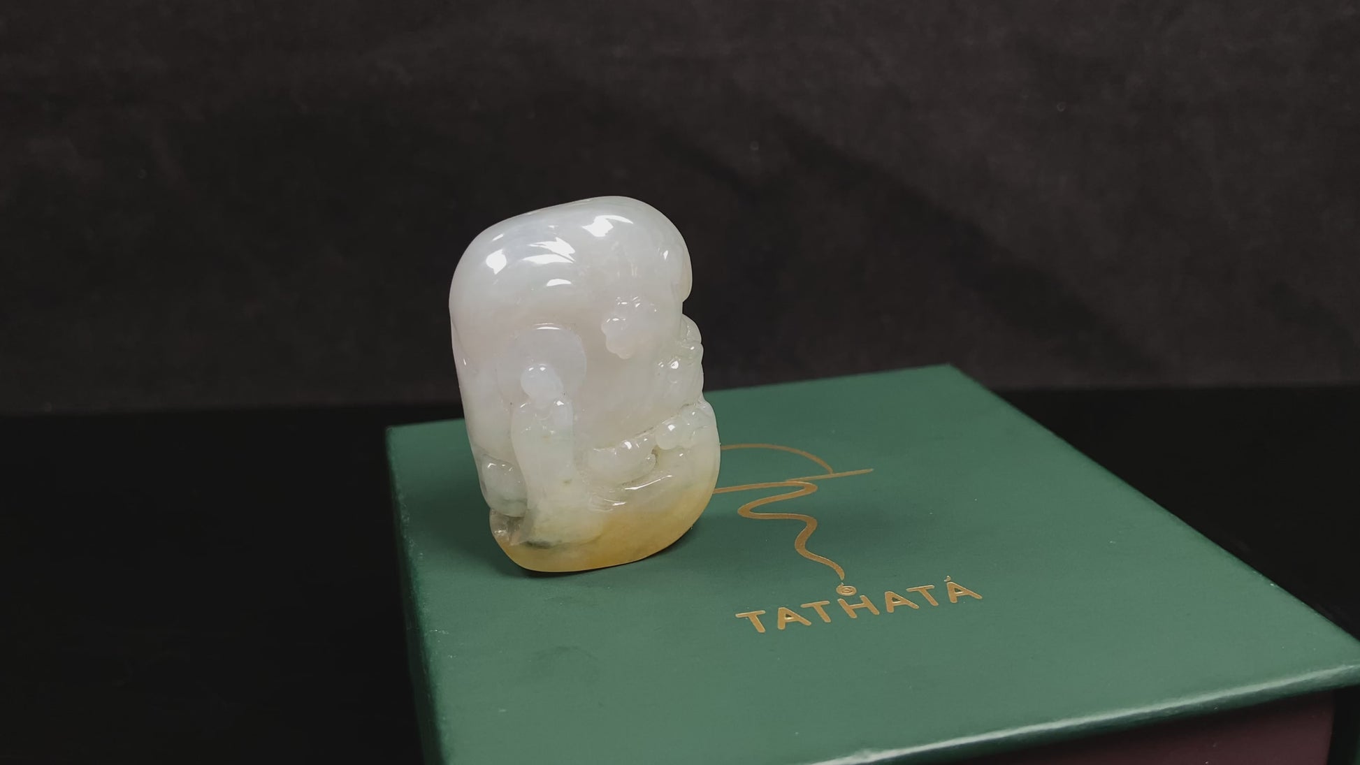 A auspicious yellow white buddha loose jadeite.
