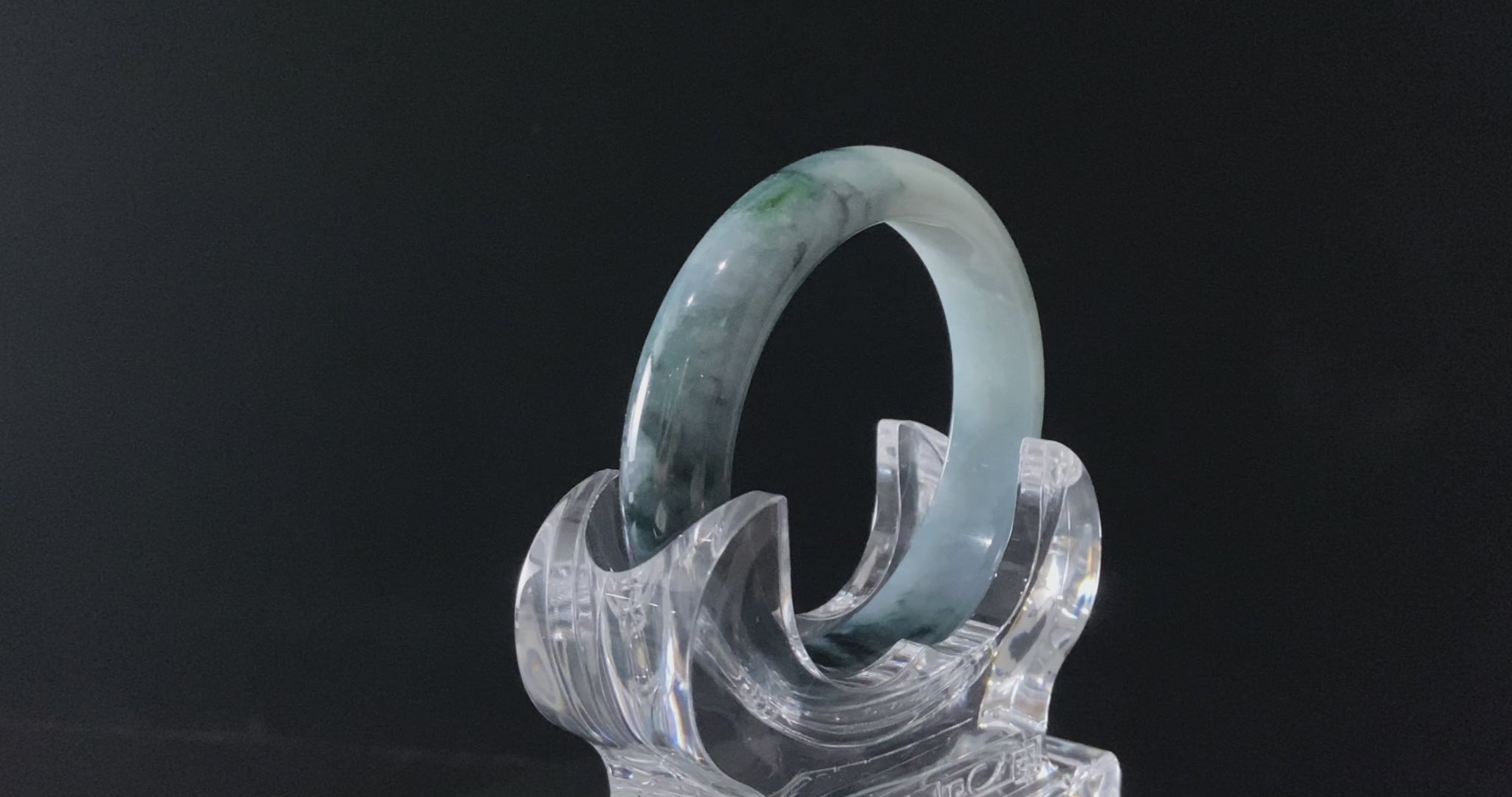 A blue dusk radiance jadeite bangle.