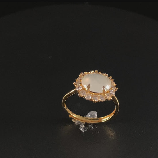 A ice white sparkle jadeite ring.