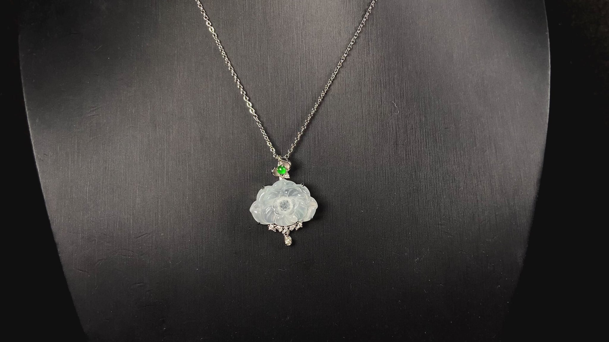 A icy peony with green glow jadeite pendant.