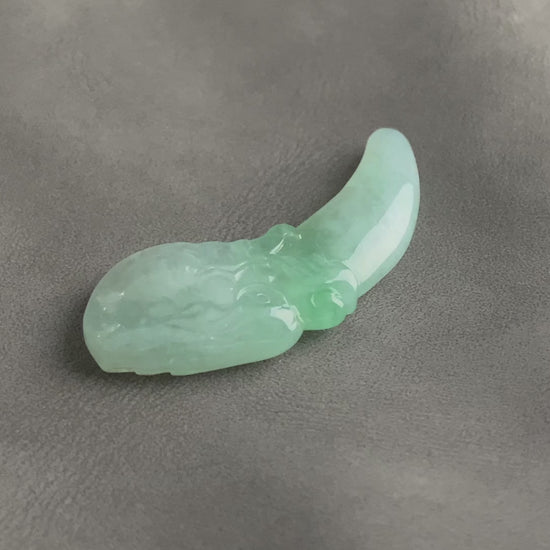 A mint lucky tusk loose jadeite.