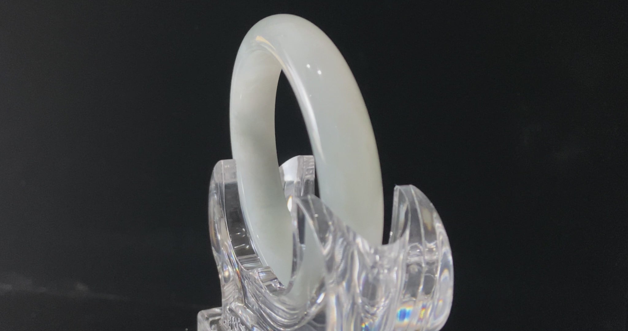 A milky white mist jadeite bangle.