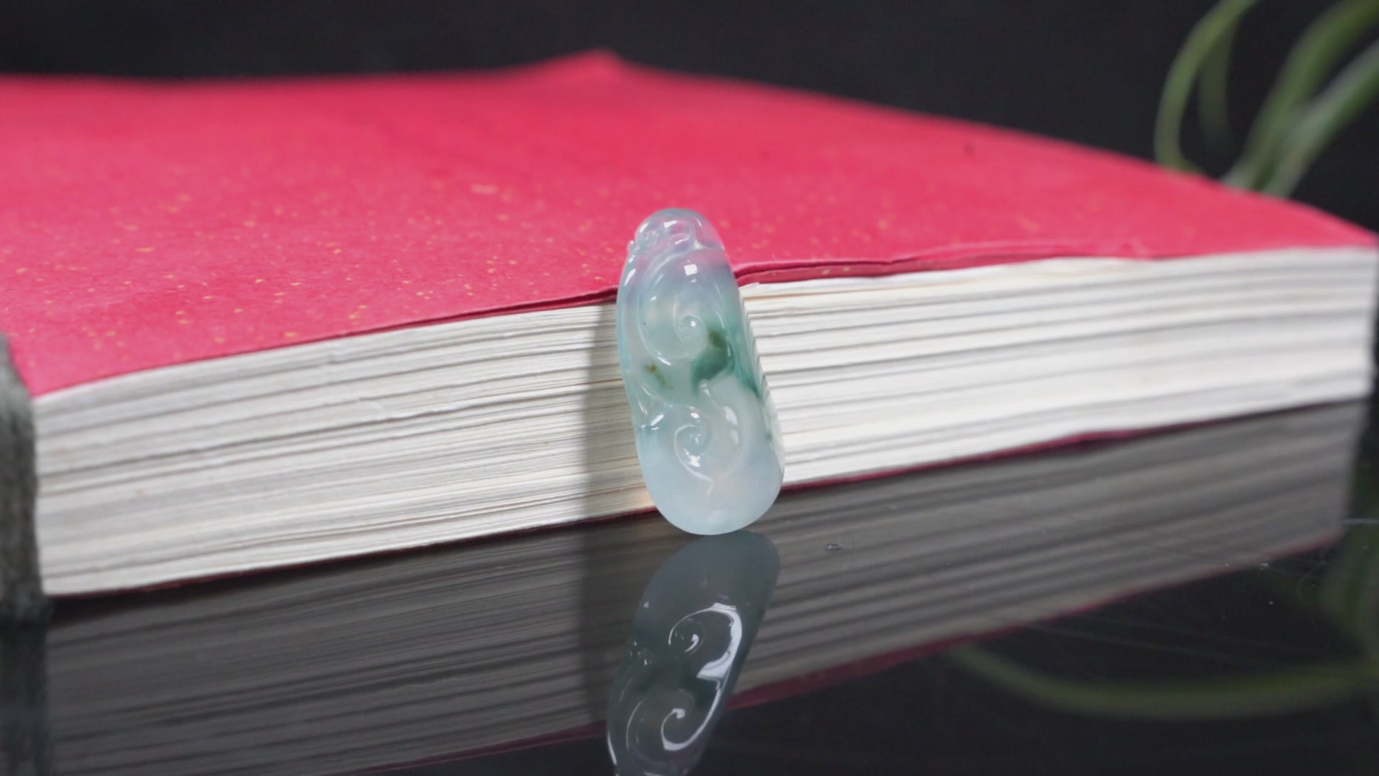 A icy translucent moss infused Ruyi loose jadeite.