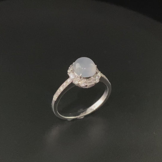 A pale dew drop jadeite ring.