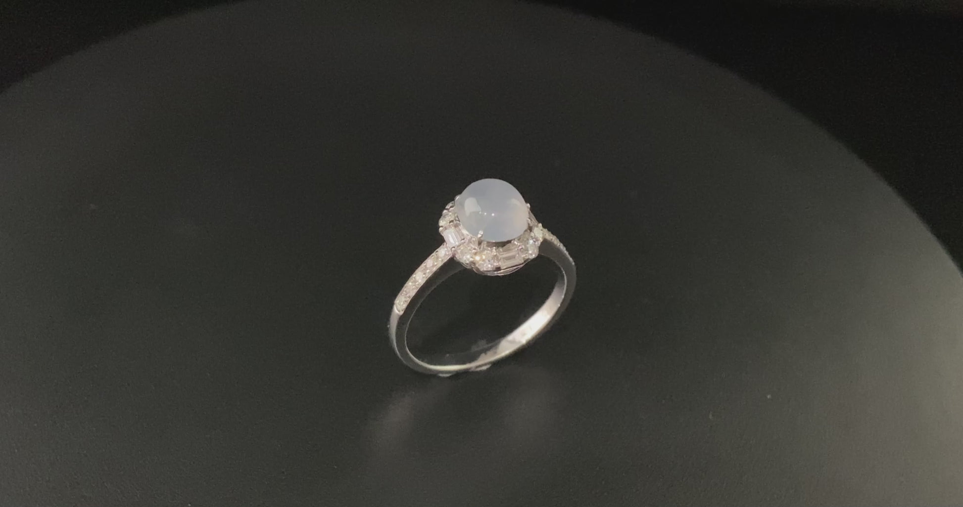 A pale dew drop jadeite ring.