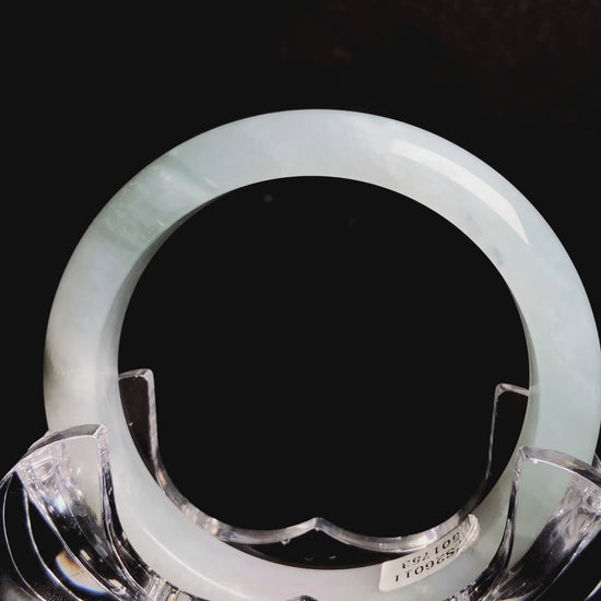 A pale azure cloud white jadeite bangle.
