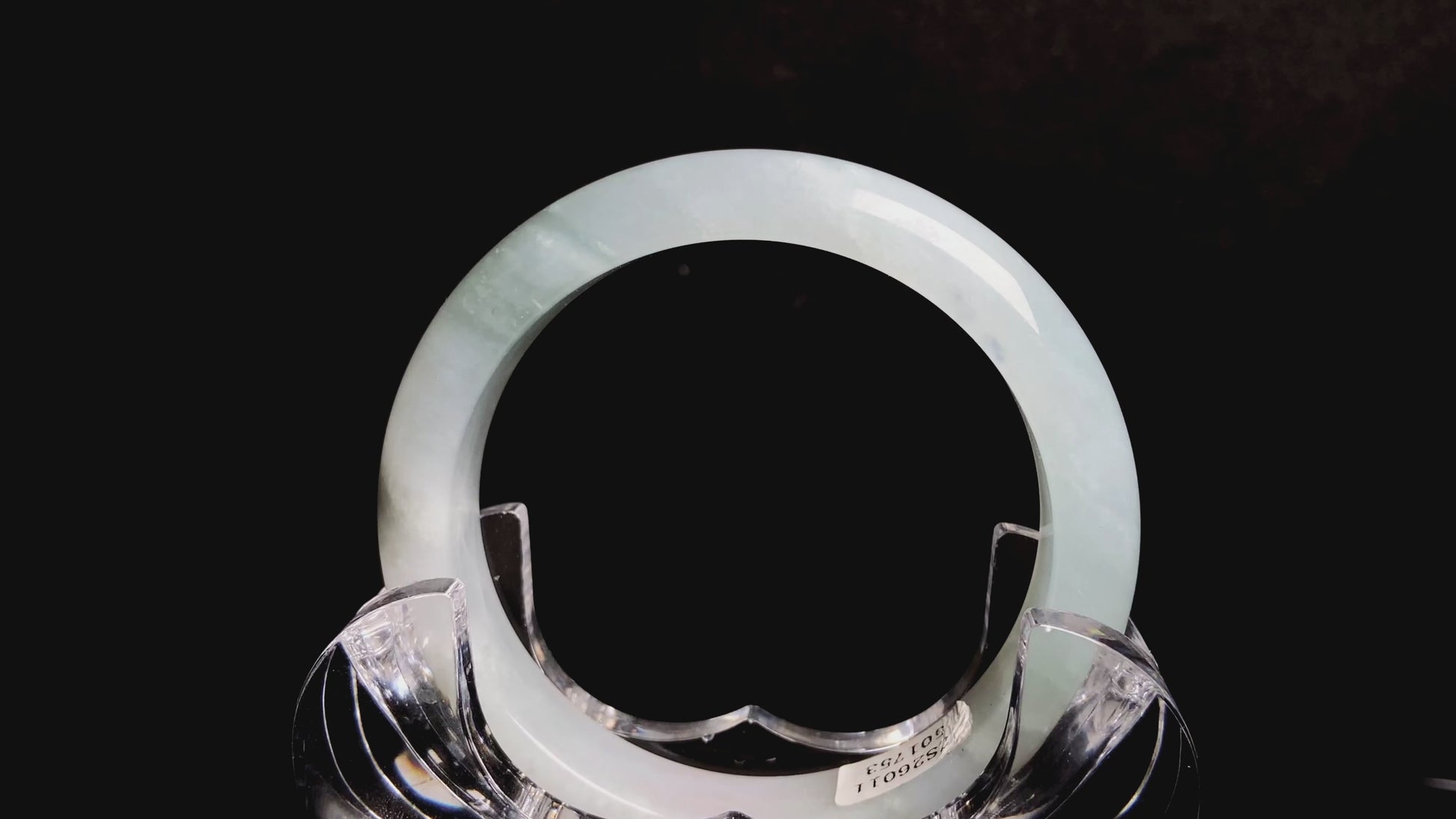 A pale azure cloud white jadeite bangle.