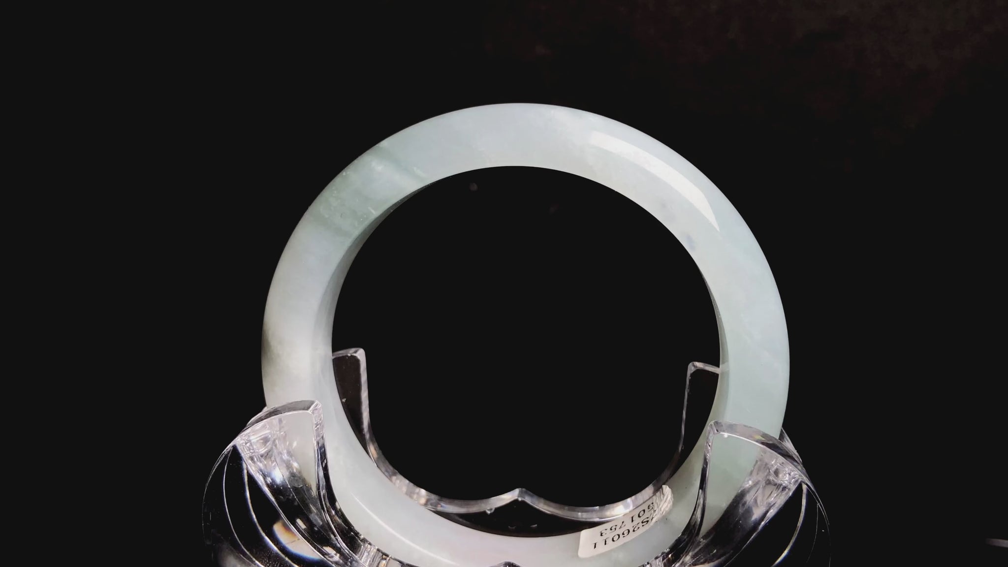A pale azure cloud white jadeite bangle.