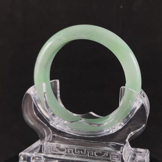 A pale spring green mist jadeite bangle.