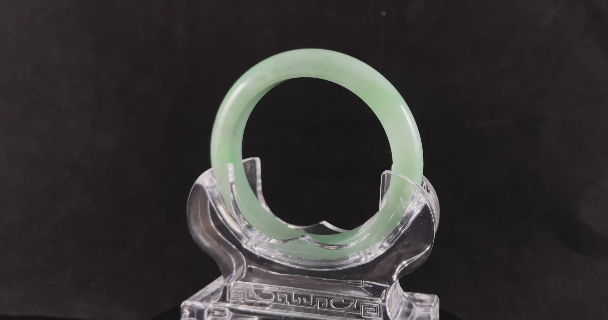 A pale spring green mist jadeite bangle.