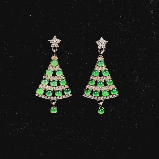 A pair of lucky green christmas tree jadeite earrings.