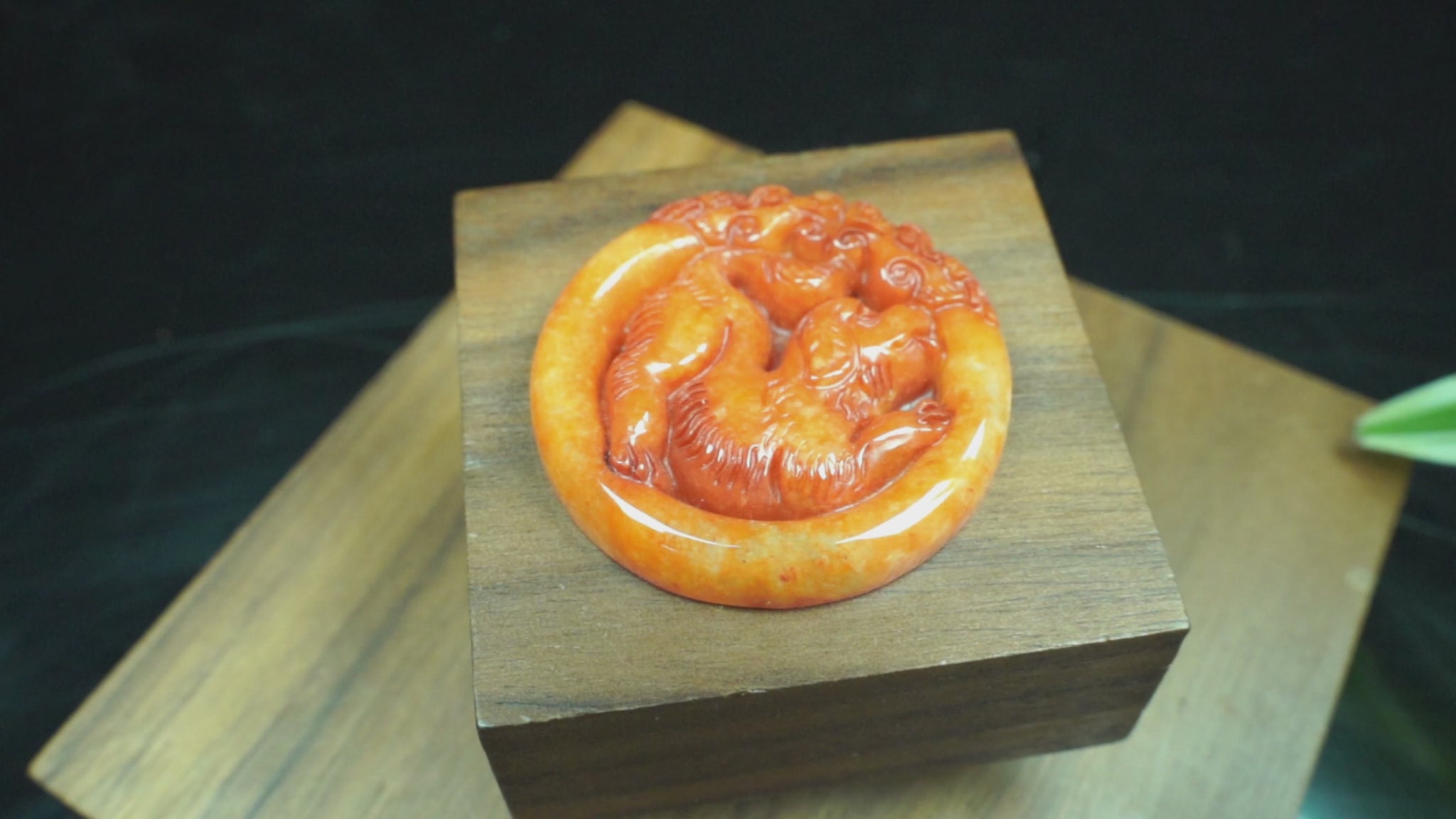 A glowing orange red dog loose jadeite.