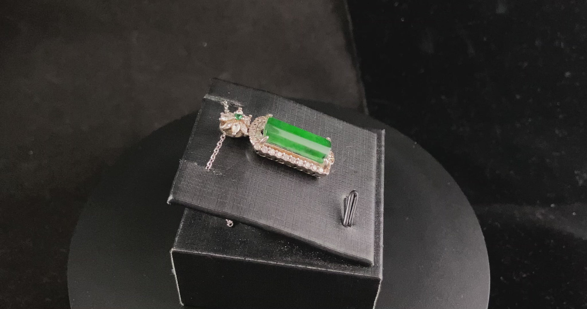 A rich green star frame jadeite pendant.