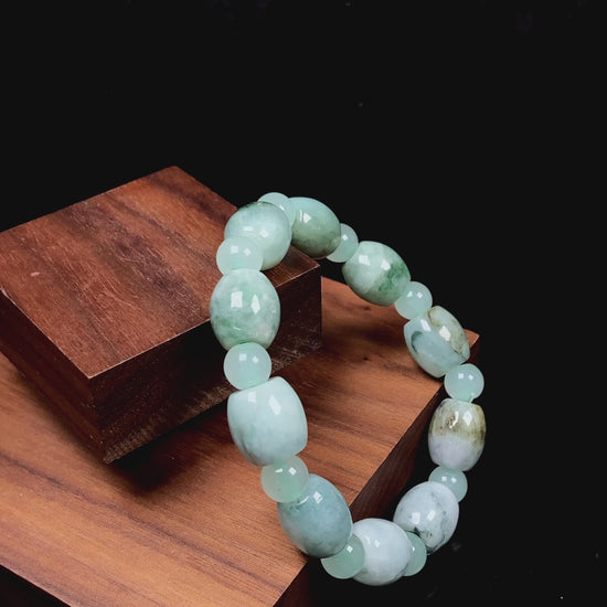 A tri-color green white gray barrel & round beads jadeite beads bracelet.