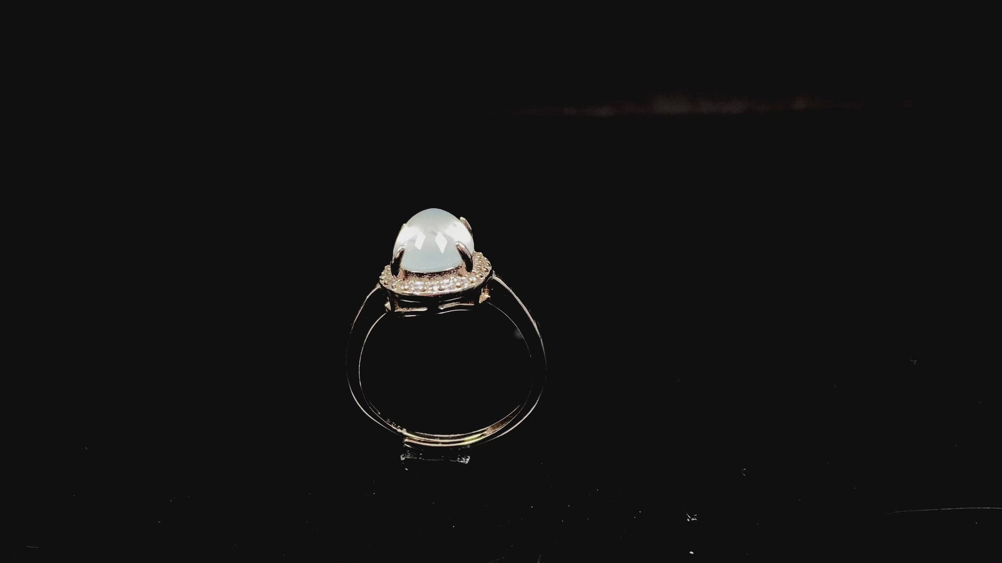 A frosted white luster jadeite ring.