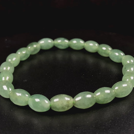 A green shadow luminance jadeite beads bracelet.