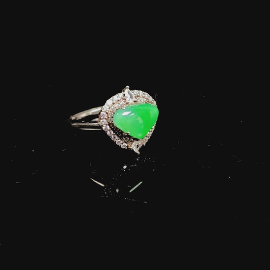 A apple green heart jadeite ring.