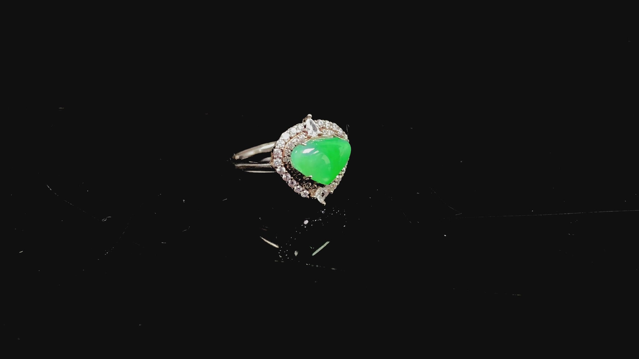 A apple green heart jadeite ring.