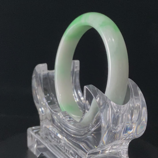 A ivory sprout sheen jadeite bangle.