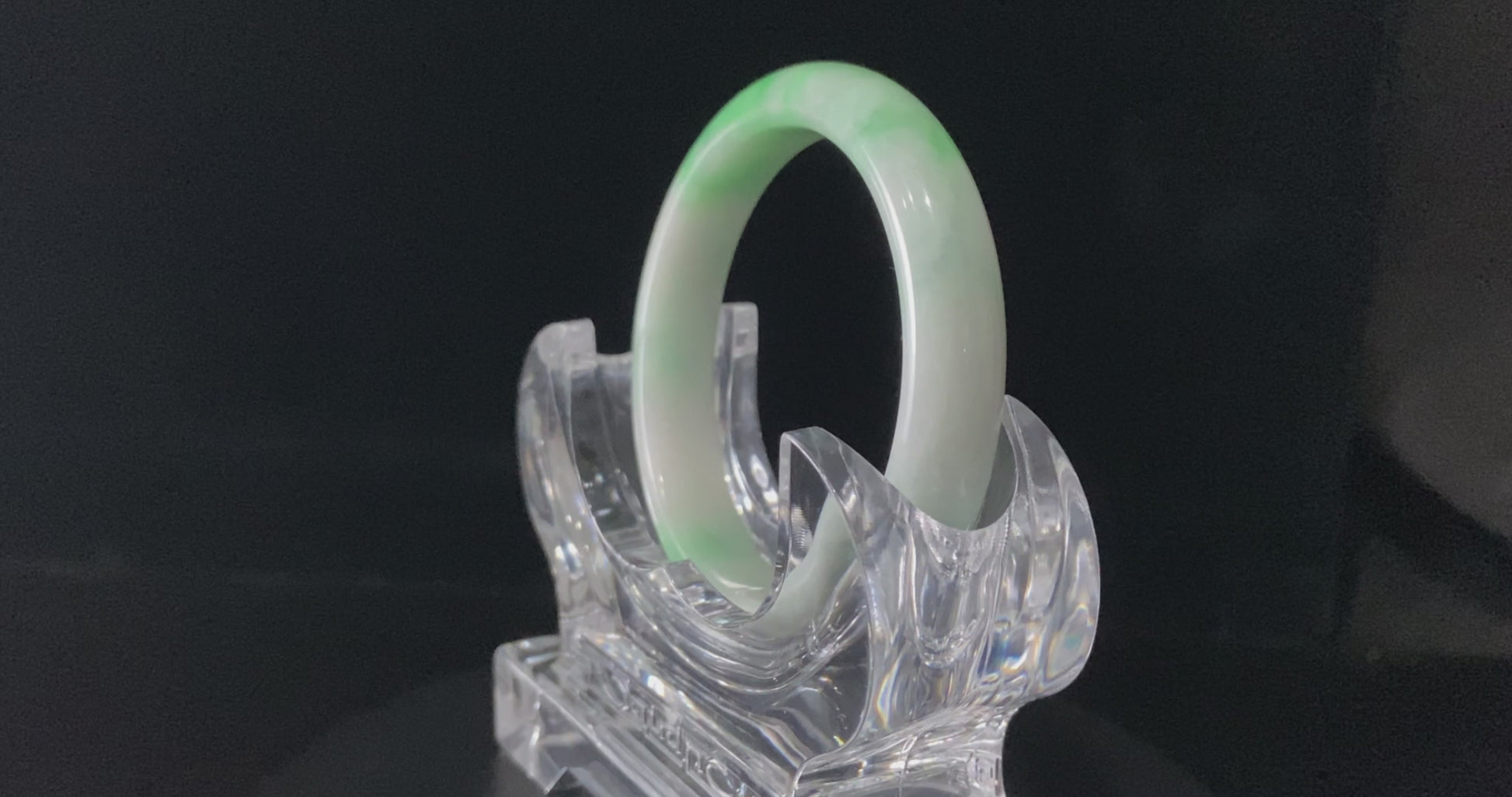 A ivory sprout sheen jadeite bangle.