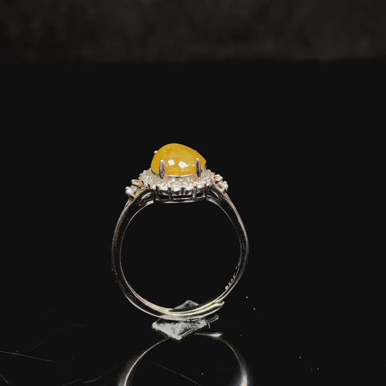 A apricot-hued jadeite bangle.