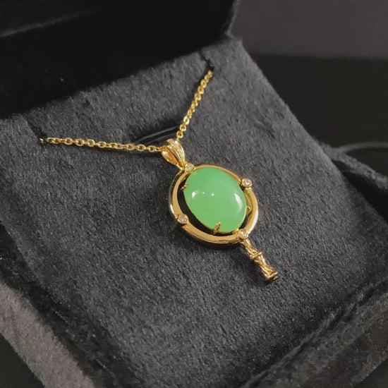 A apple green star finder jadeite pendant.