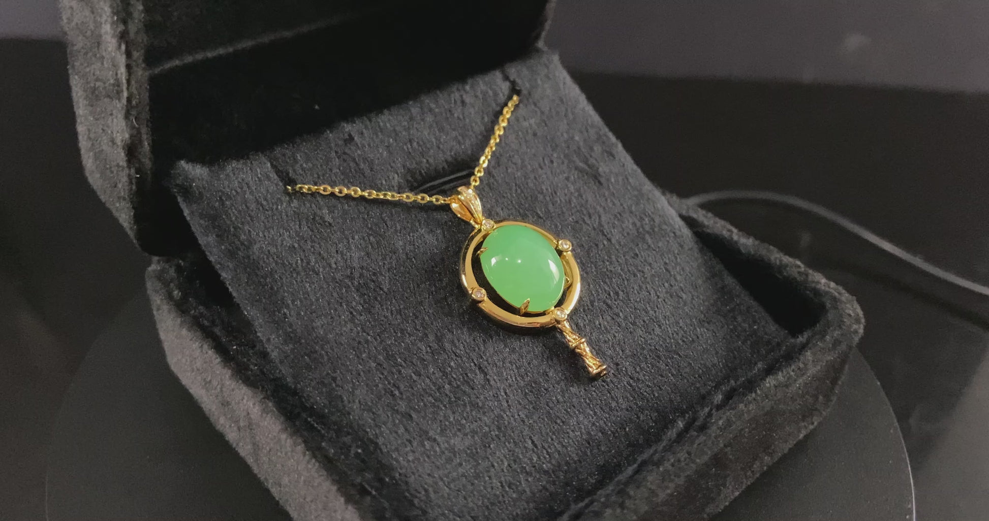 A apple green star finder jadeite pendant.