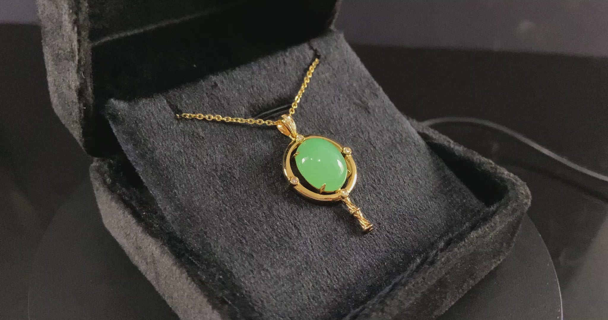 A apple green star finder jadeite pendant.