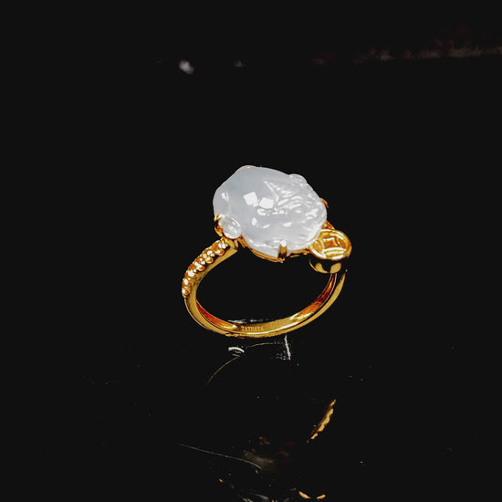 A icy white fortune Pixiu jadeite ring.