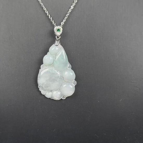 A auspicious dew fortune jadeite pendant.