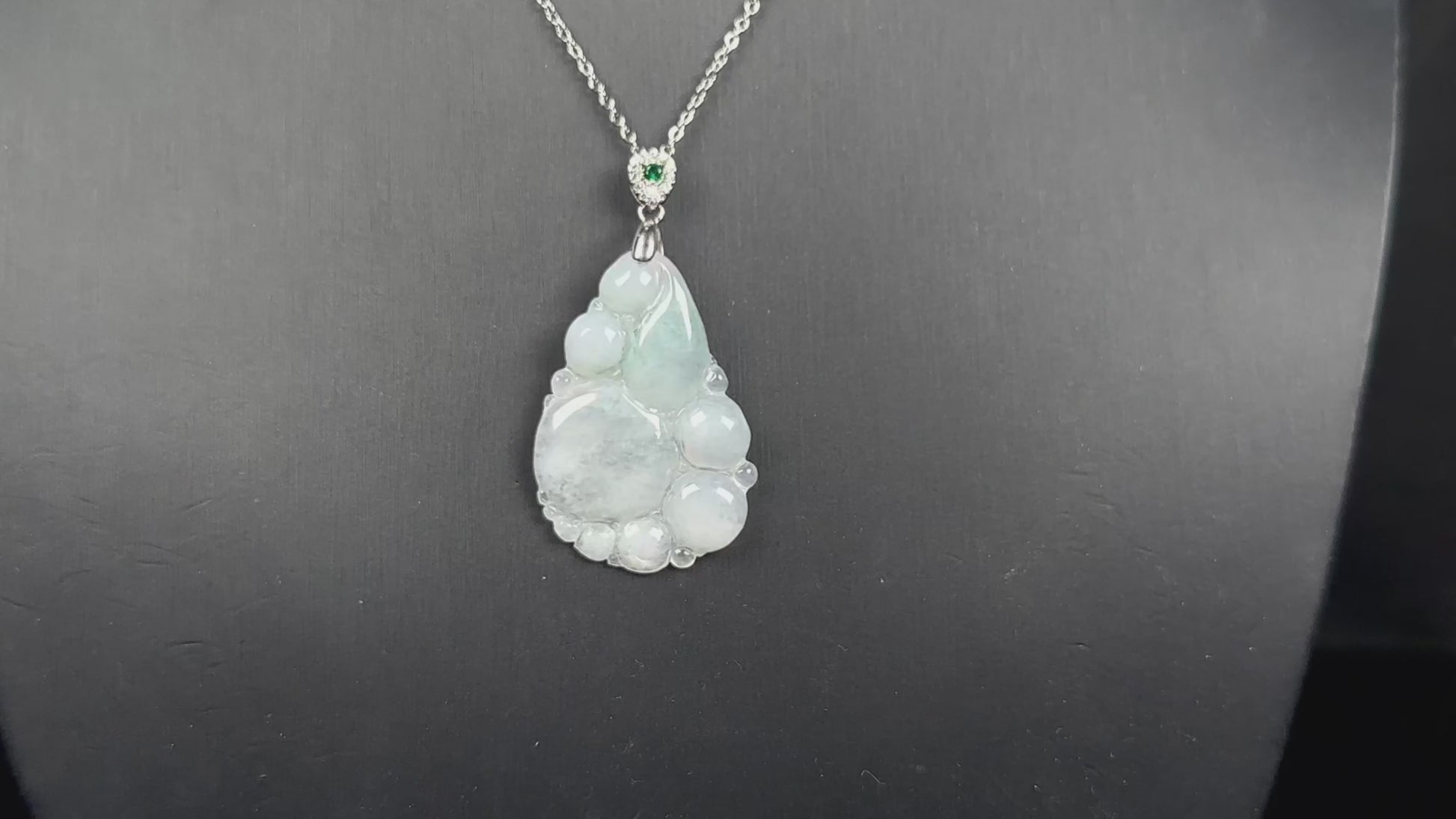 A auspicious dew fortune jadeite pendant.