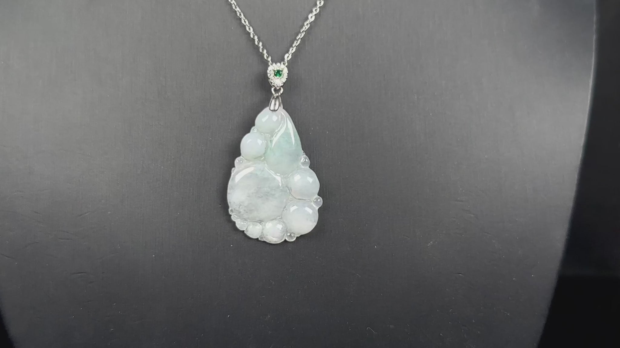 A auspicious dew fortune jadeite pendant.