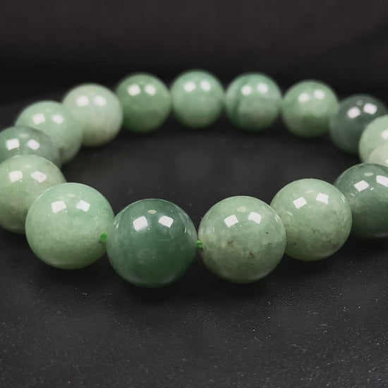 A verdant misty green jadeite beads bracelet.