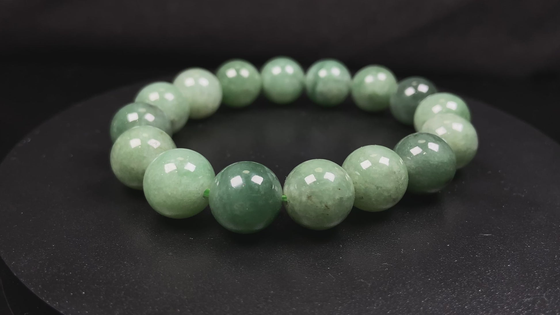 A verdant misty green jadeite beads bracelet.