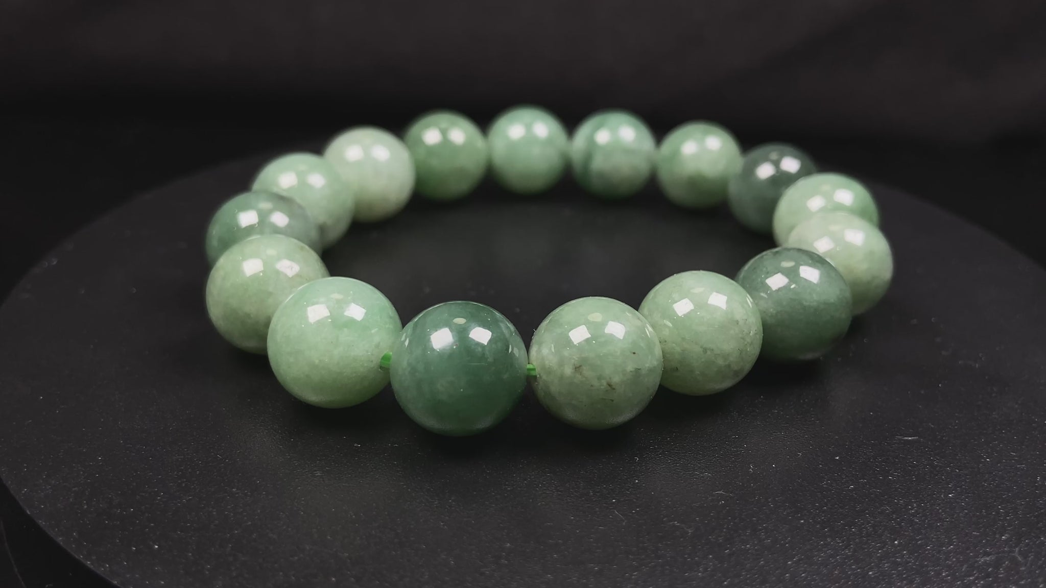 A verdant misty green jadeite beads bracelet.