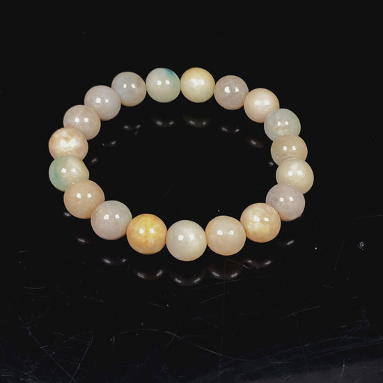 A honeyed oat ash green mix jadeite beads bracelet.