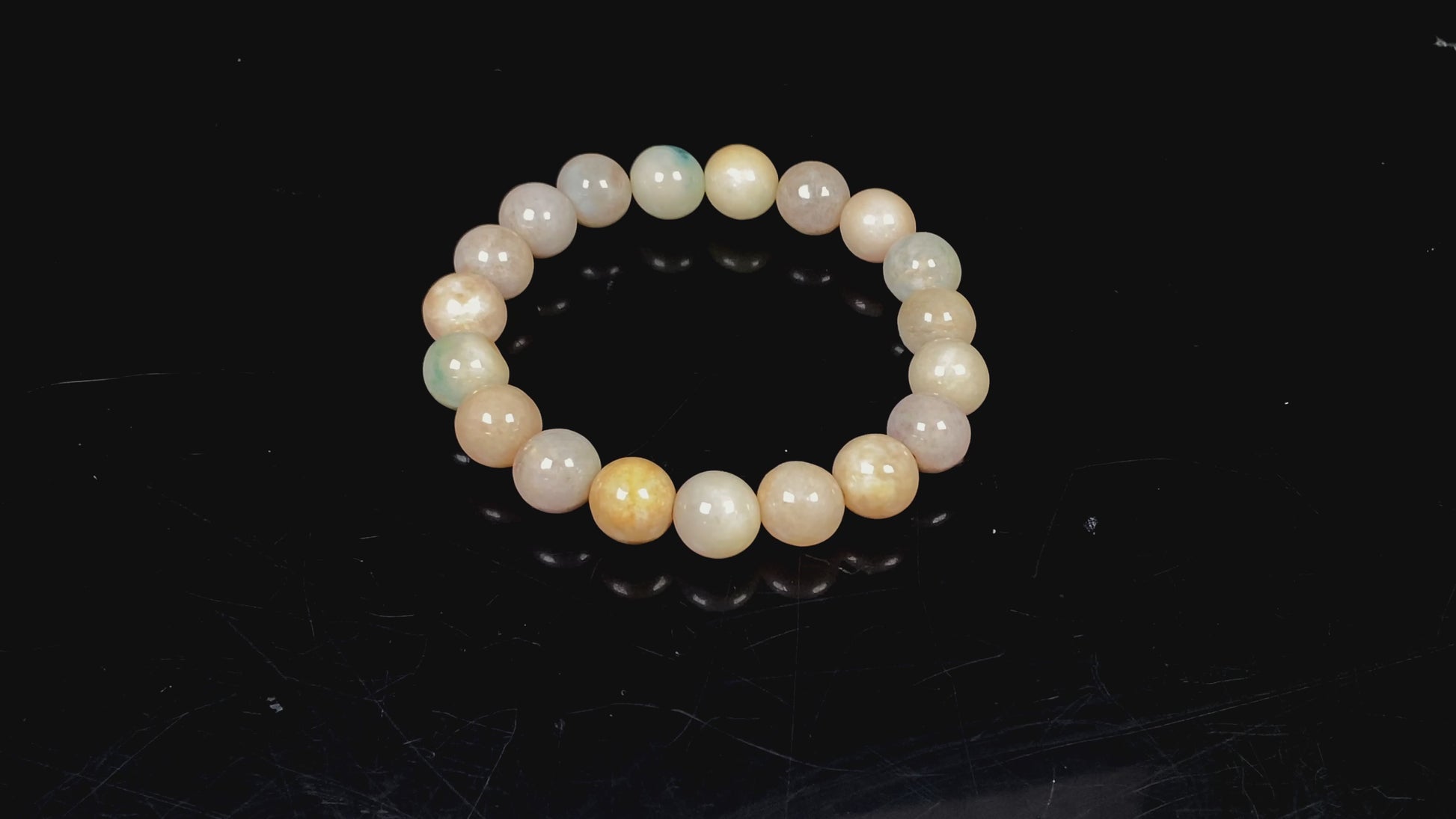 A honeyed oat ash green mix jadeite beads bracelet.