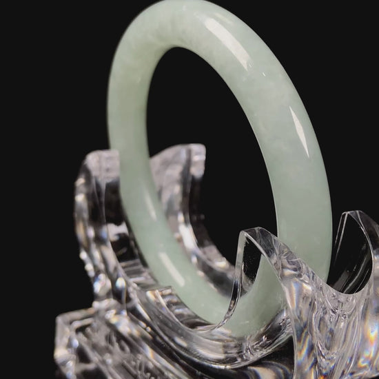 A dewy green jadeite bangle.