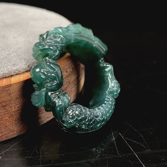 A rich teal dragon jadeite ring.